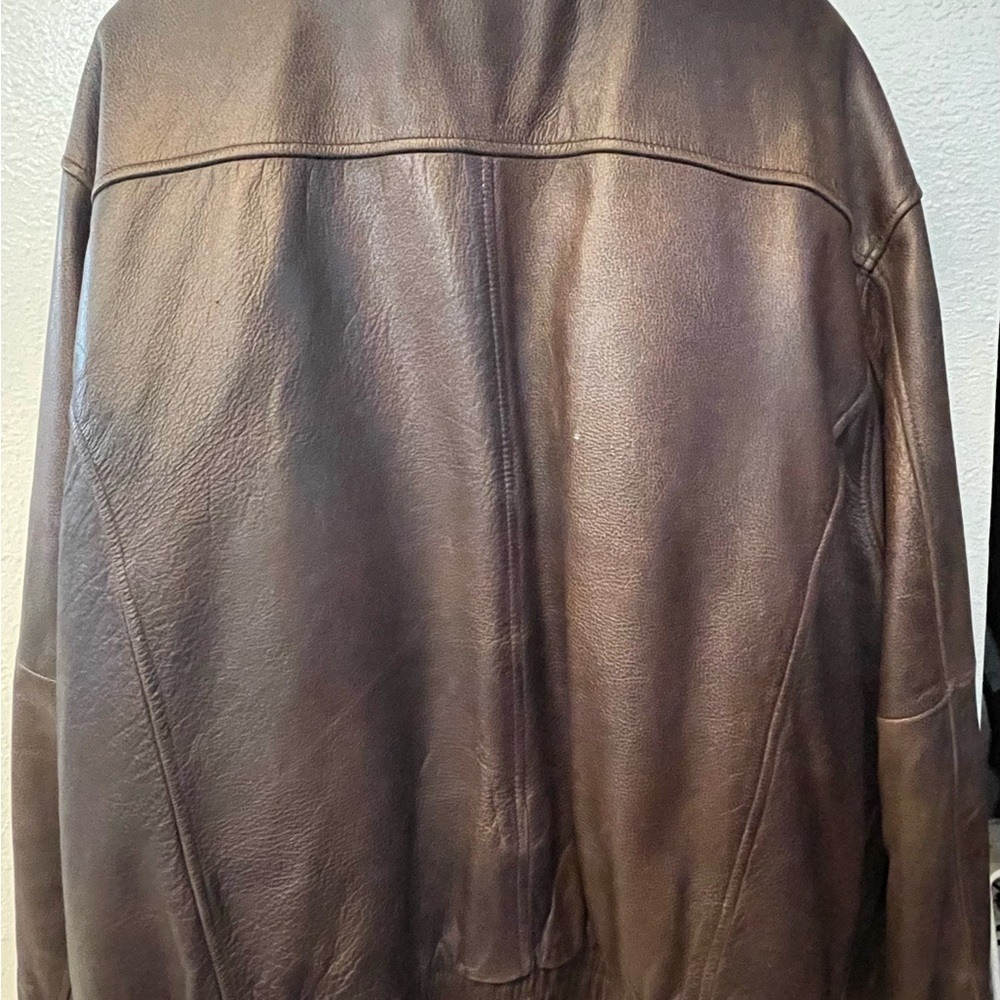 Vintage leather bomber jacket with removable lining flag and airplane graphic